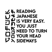 Black iron-on text reading Reading Japanese is very easy with vertical sideways lettering at left