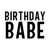 Flat black artwork on white: 'BIRTHDAY BABE' in tall bold capitals, iron-on transfer design