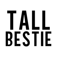 Flat black artwork on white: 'TALL BESTIE' in tall bold capitals, iron-on transfer design