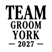 Flat black artwork on white: 'TEAM GROOM YORK' in serif capitals with '2027' between dashes, iron-on transfer design