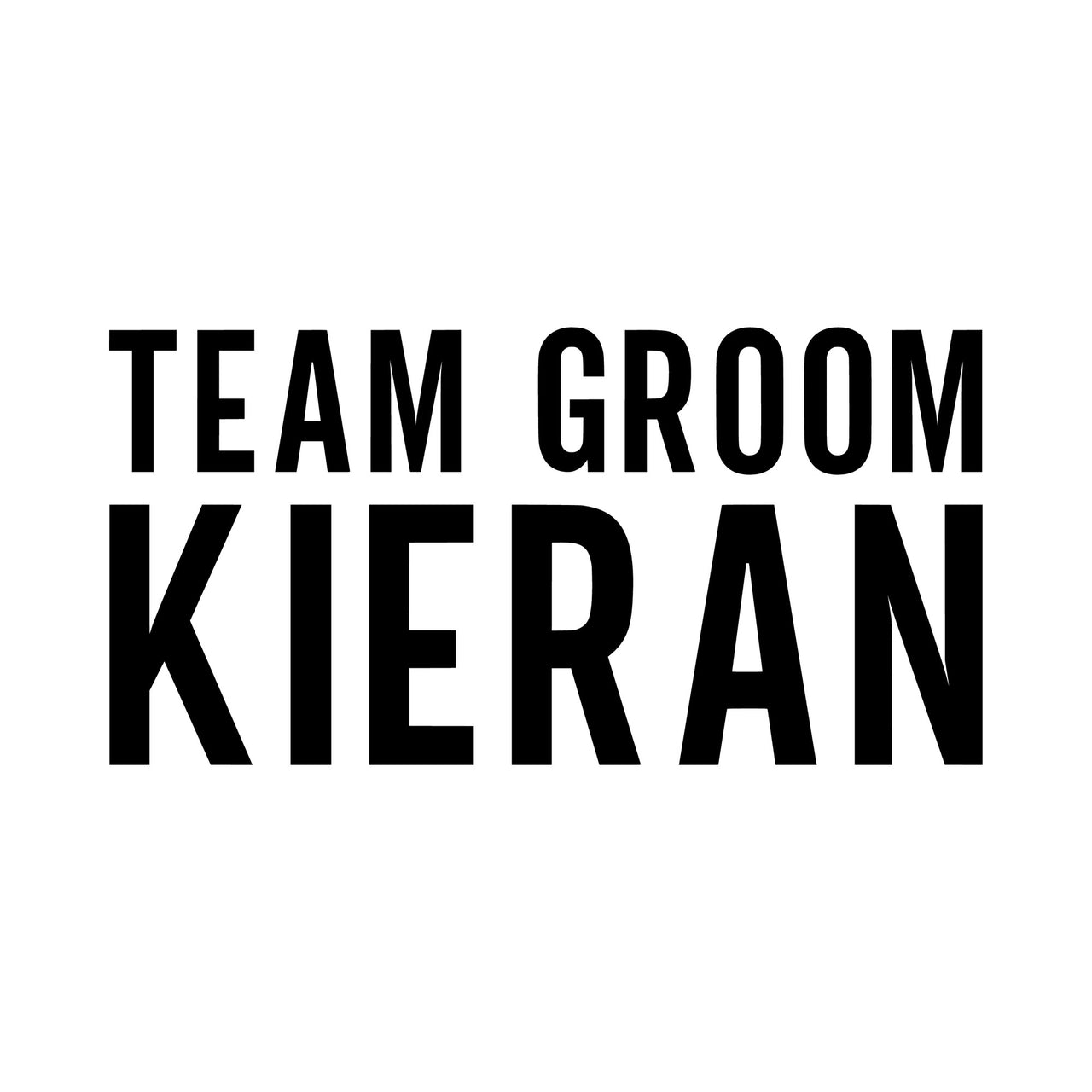 Flat black artwork on white: 'TEAM GROOM' over 'KIERAN' in bold condensed capitals, personalised stag party iron-on design