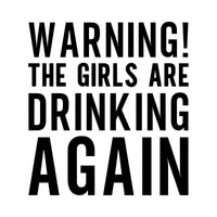 Flat black artwork on white: 'WARNING! THE GIRLS ARE DRINKING AGAIN' in tall capitals, iron-on transfer design