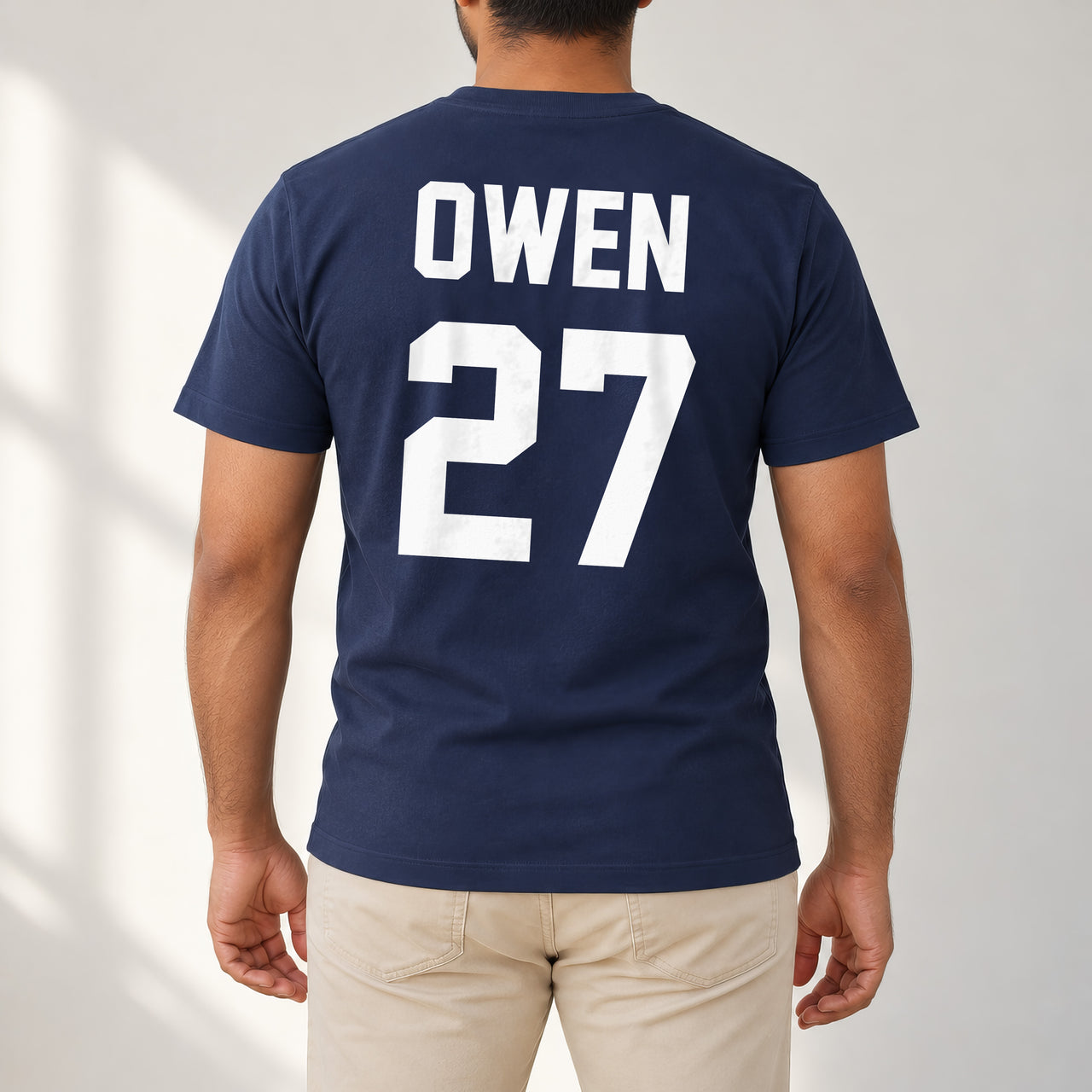 5-a-Side Football Name Number Iron-On Transfer, shown on a navy t-shirt (back view)