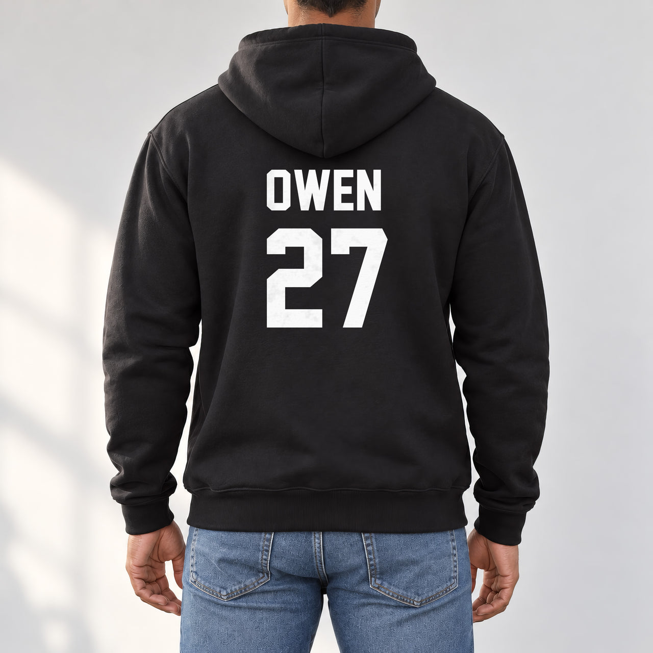 5-a-Side Football Name Number Iron-On Transfer, shown on a black hoodie (back view)