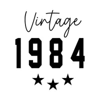 Flat 'Vintage 1984' artwork, script word over bold year with three stars below, iron-on transfer design