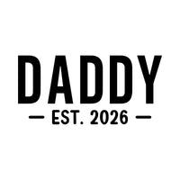 Flat artwork: 'DADDY' with '- EST. 2026 -' underneath in black - iron-on vinyl transfer design