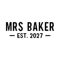 Flat artwork: black 'MRS BAKER' with 'EST. 2027' between two dashes - iron-on vinyl transfer design