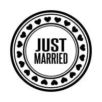 Flat artwork: round stamp with 'JUST MARRIED' in the centre and a ring of hearts, wedding iron-on transfer