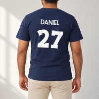 Adult Football Shirt Name Number Iron-On Transfer, shown on a navy t-shirt (back view)
