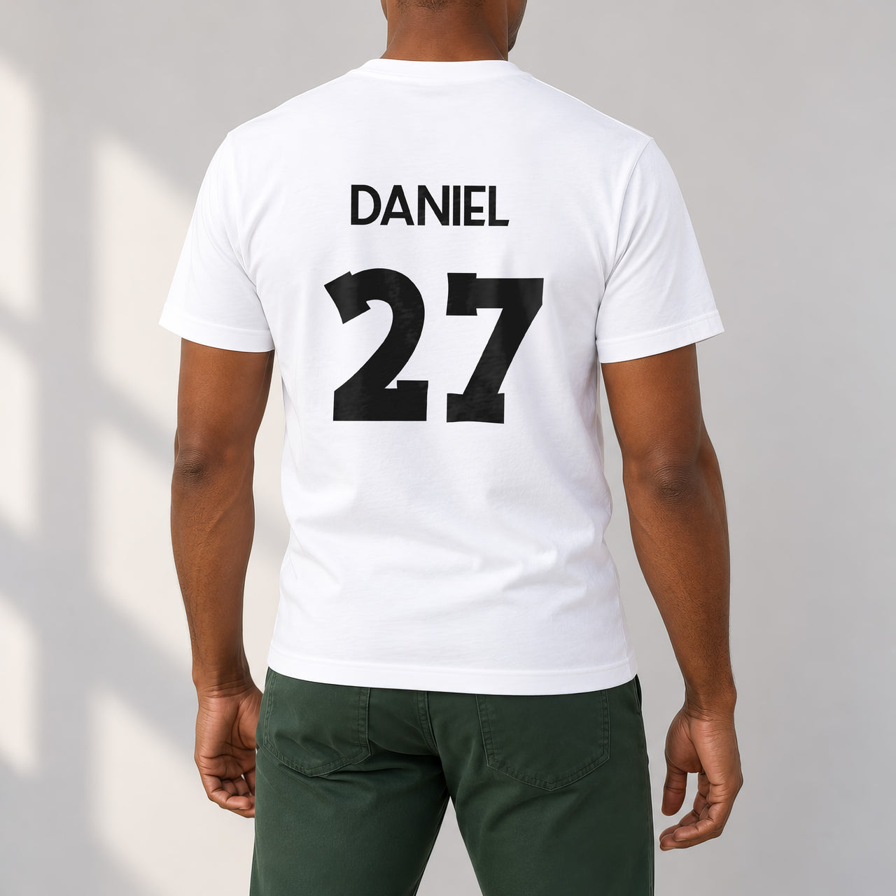 Adult Football Shirt Name Number Iron-On Transfer, shown on a white t-shirt (back view)