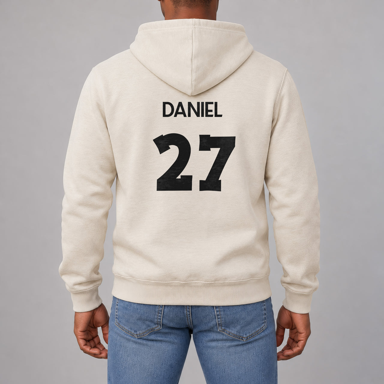 Adult Football Shirt Name Number Iron-On Transfer, shown on a natural hoodie (back view)
