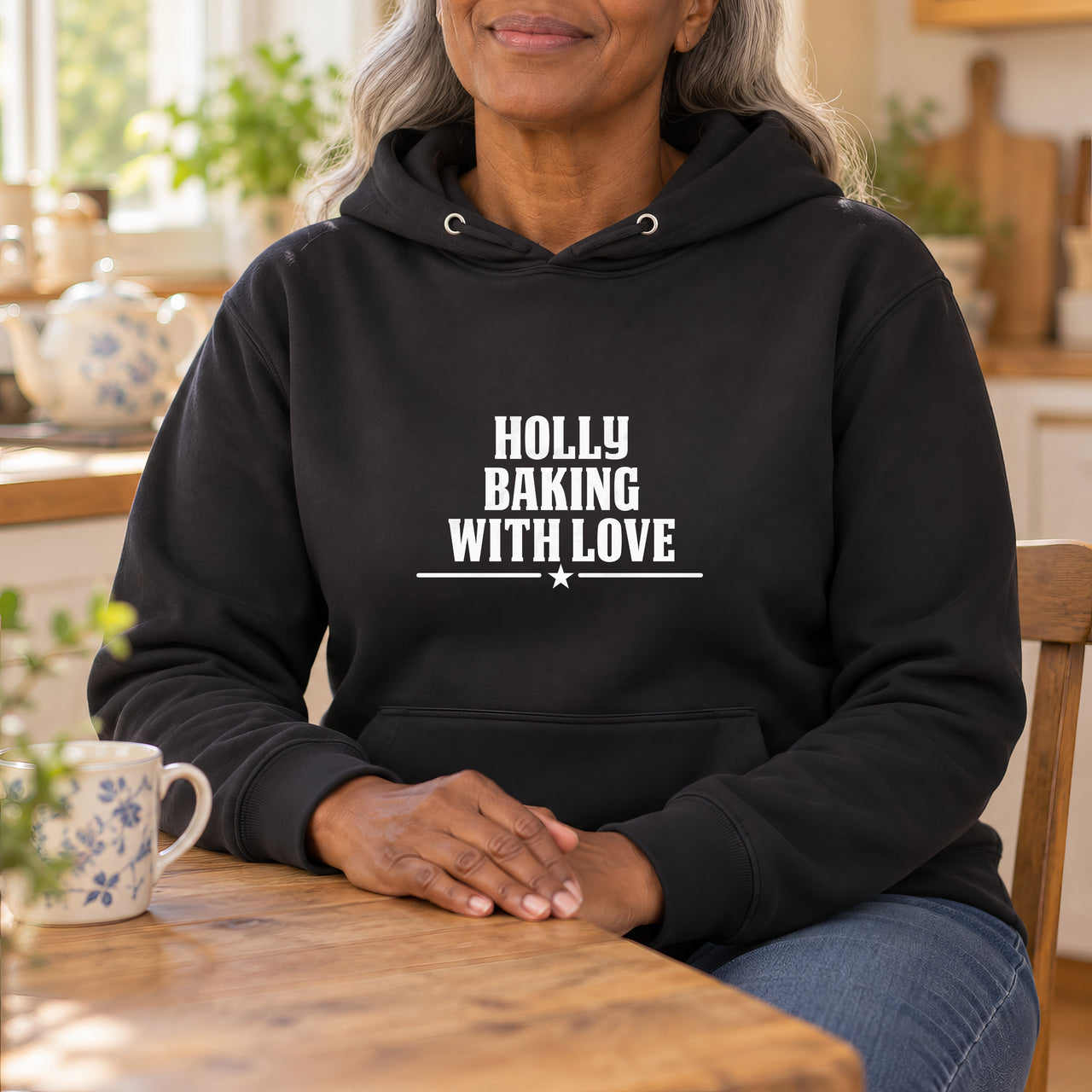 Baking With Love Iron-On Transfer - Personalised Name Design, shown on a black hoodie
