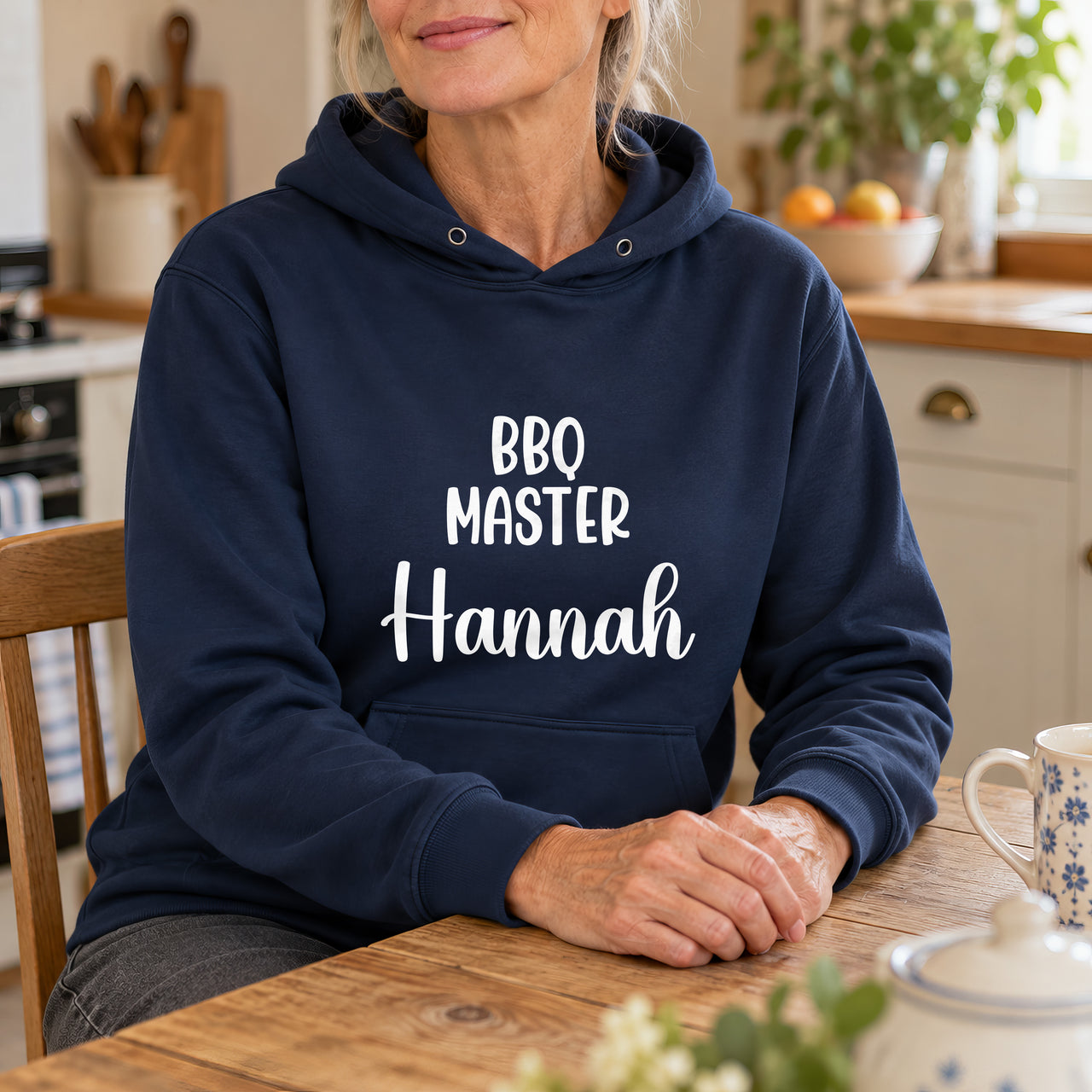 BBQ Masterchef Iron-On Transfer - Personalised Name Design, shown on a navy hoodie