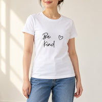 White T-shirt with the Be Kind Script Heart design printed on the chest
