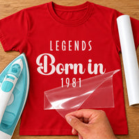 Legends Born In iron-on transfer: white LEGENDS Born in 1981 on a red T-shirt, film being peeled