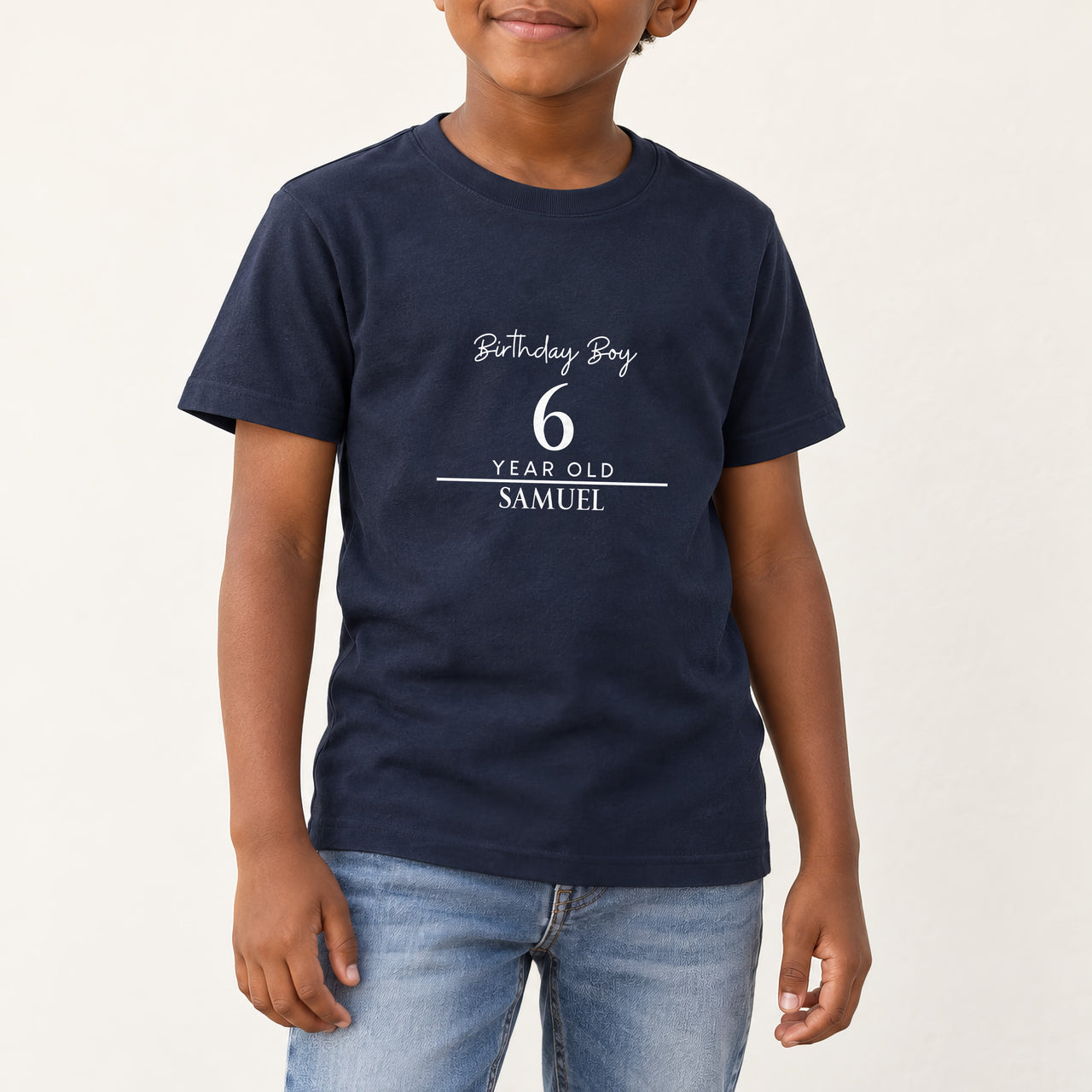 Birthday Boy Age and Name Iron-On Transfer - Personalised, shown on a navy kids t-shirt