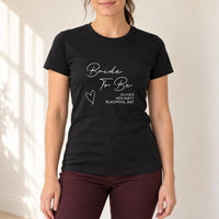 Bride To Be Fine Script Heart Hen Party Iron-On Transfer, shown on a black t-shirt