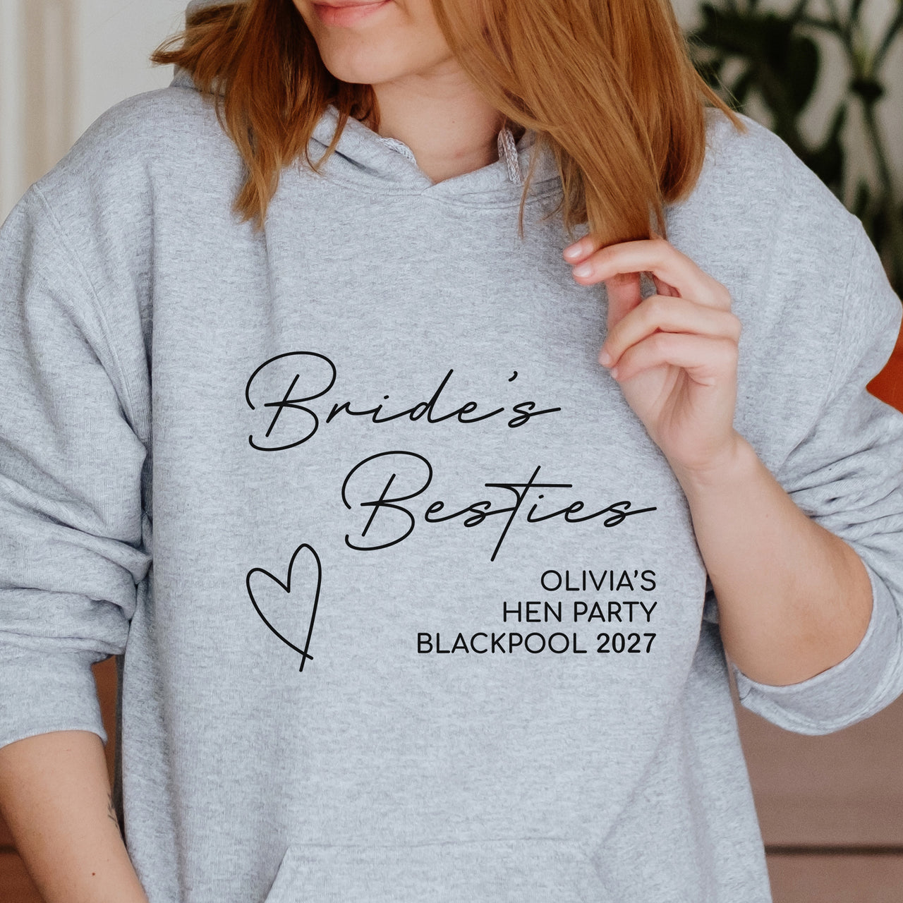 Bride's Besties Hen Party Iron-On Transfer shown on a hoodie