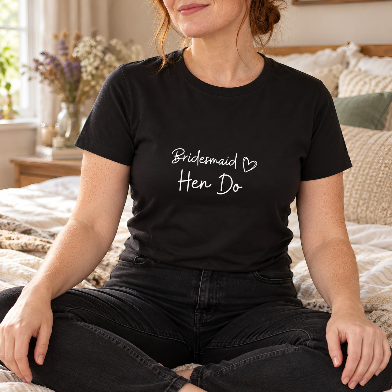 Black T-shirt with the Bridesmaid Hen Do Heart design printed on the chest