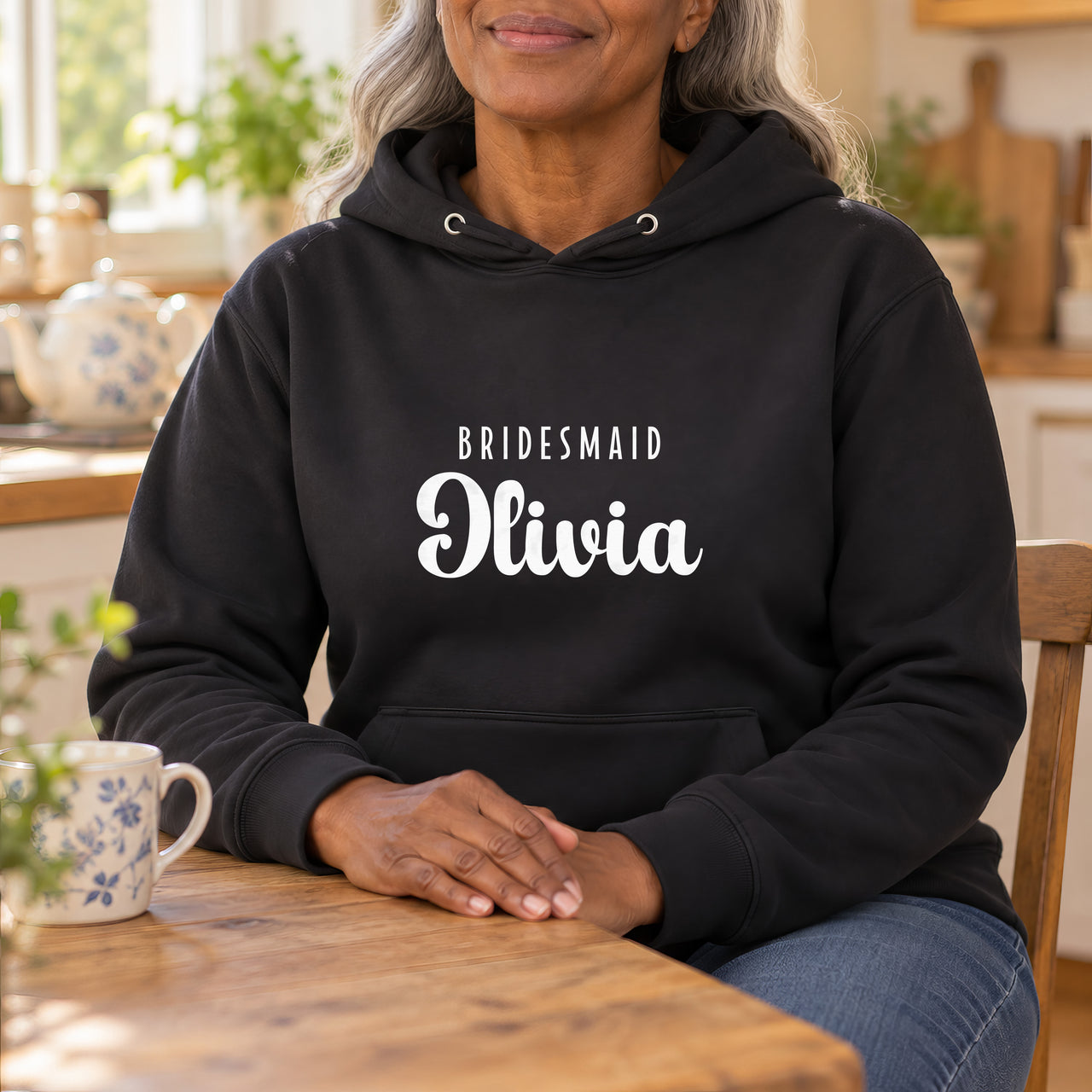 Bridesmaid Name Iron-On Transfer, shown on a black hoodie