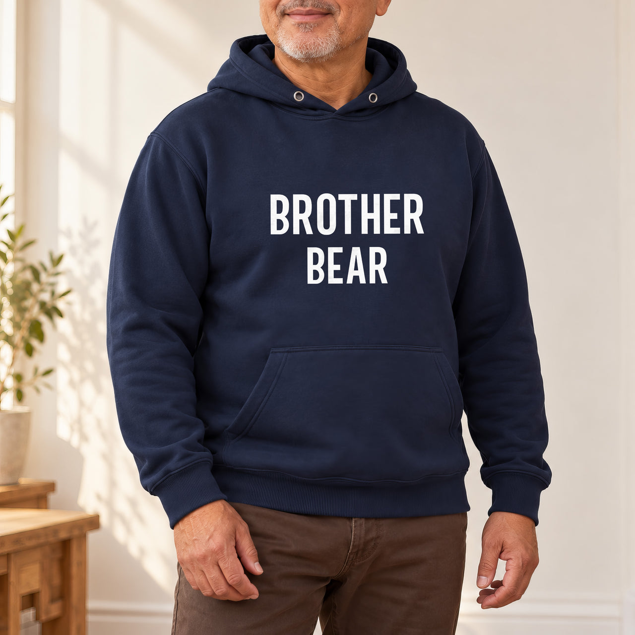 Brother Bear Iron-On Transfer, shown on a navy hoodie