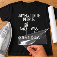 Black T-shirt with white 'MY FAVOURITE PEOPLE call me GRANDPA' iron-on transfer in mixed fonts, iron and white vinyl roll