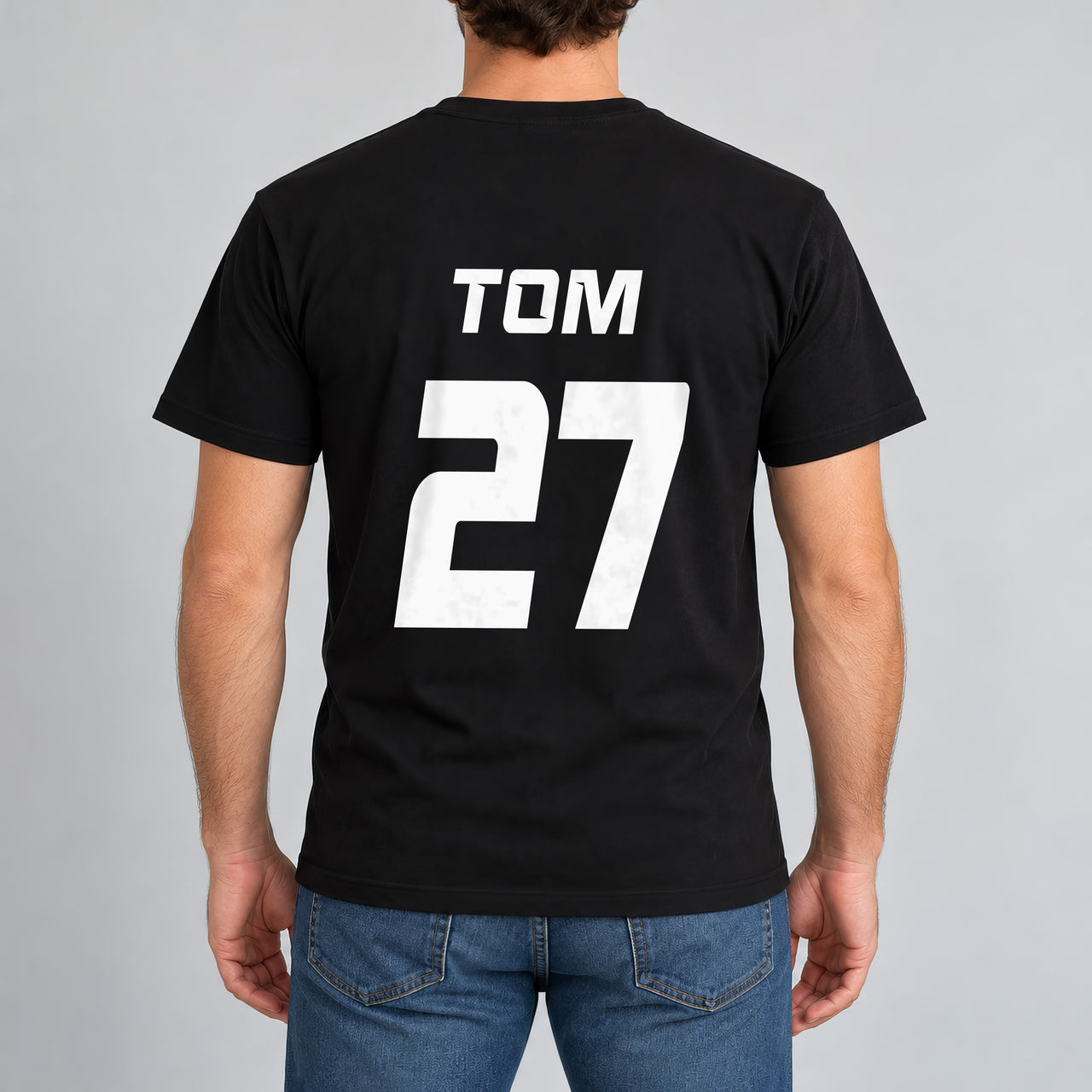 Black T-shirt with the Charity Match Name and Number design printed on the back