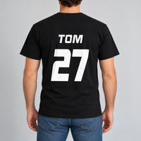Black T-shirt with the Charity Match Name and Number design printed on the back