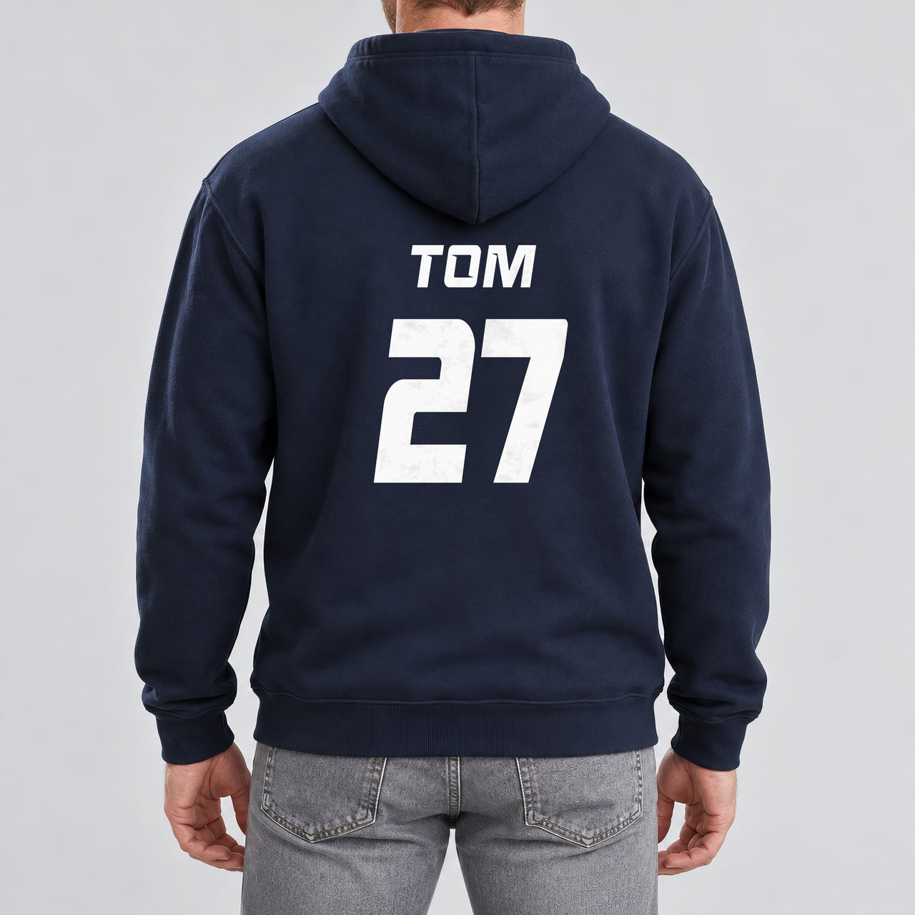 Navy hoodie with the Charity Match Name and Number design printed on the back