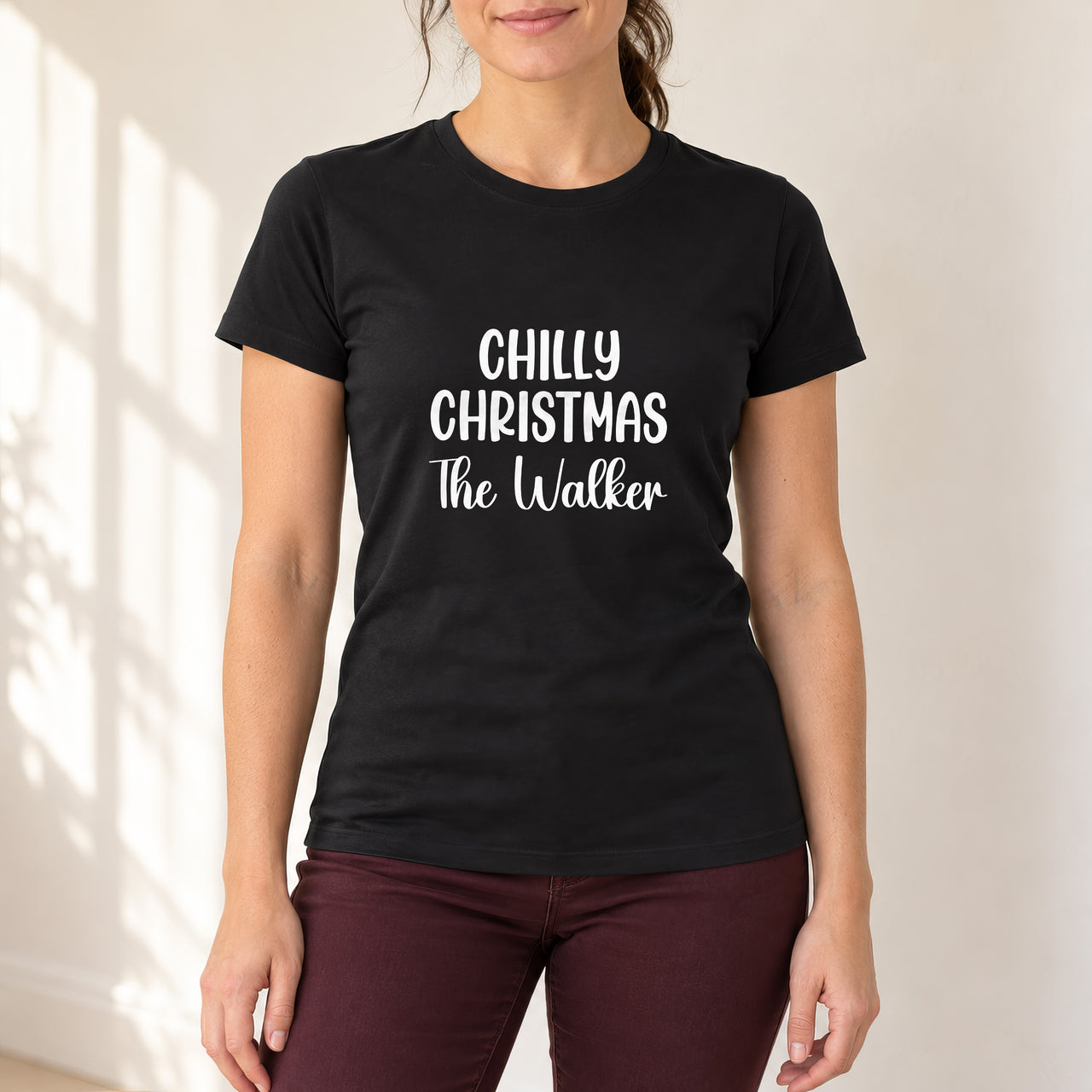 Black T-shirt with the Chilly Christmas Surname design printed on the chest
