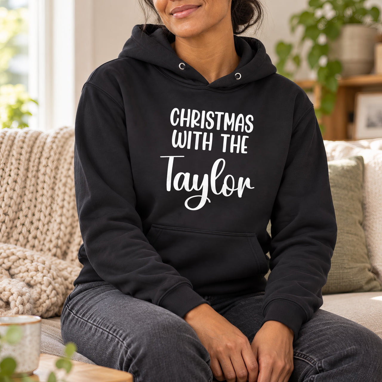 Christmas With The Family Iron-On Transfer, shown on a black hoodie