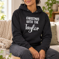 Christmas With The Family Iron-On Transfer, shown on a black hoodie