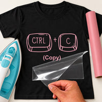 Black T-shirt with pink 'CTRL + C (Copy)' keyboard keys iron-on transfer, iron and pink vinyl roll