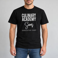 Culinary Academy Executive Chef Badge Iron-On Transfer, shown on a black t-shirt