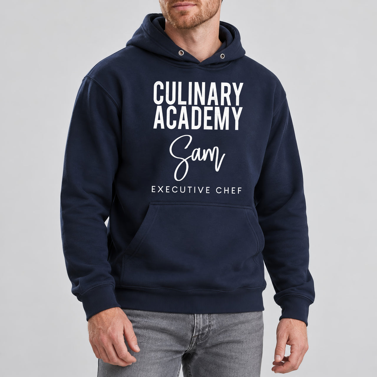 Culinary Academy Executive Chef Badge Iron-On Transfer, shown on a navy hoodie