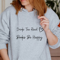 Drink Tea Read Books Be Happy Iron-On Transfer shown on a hoodie