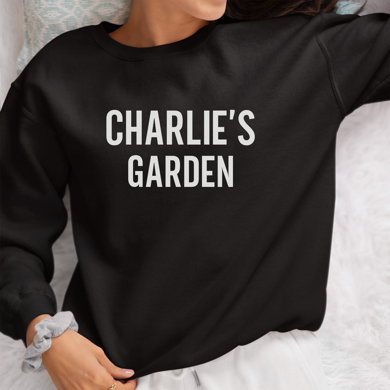 Flower Garden Name Iron-On Transfer - Personalised Name Design shown on a sweatshirt