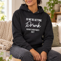 Getting Drunk Hen Party Iron-On Transfer, shown on a black hoodie