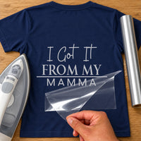 Got It From My Mamma iron-on transfer: silver I Got It FROM MY MAMMA on a navy T-shirt, film being peeled