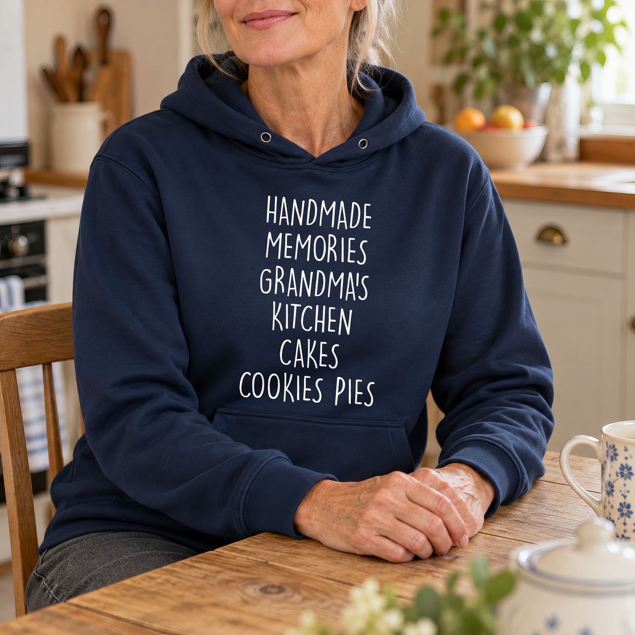 Navy hoodie with the Grandma's Kitchen design printed on the chest