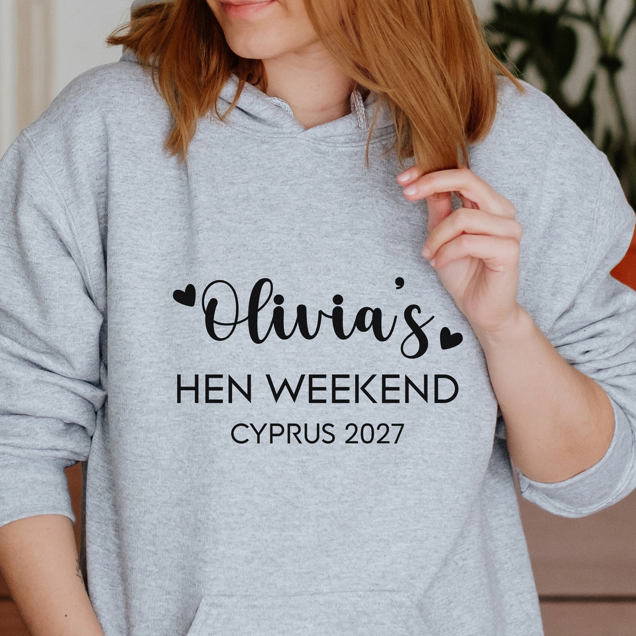 Hen Weekend Iron-On Transfer - Personalised Place & Year Design shown on a hoodie