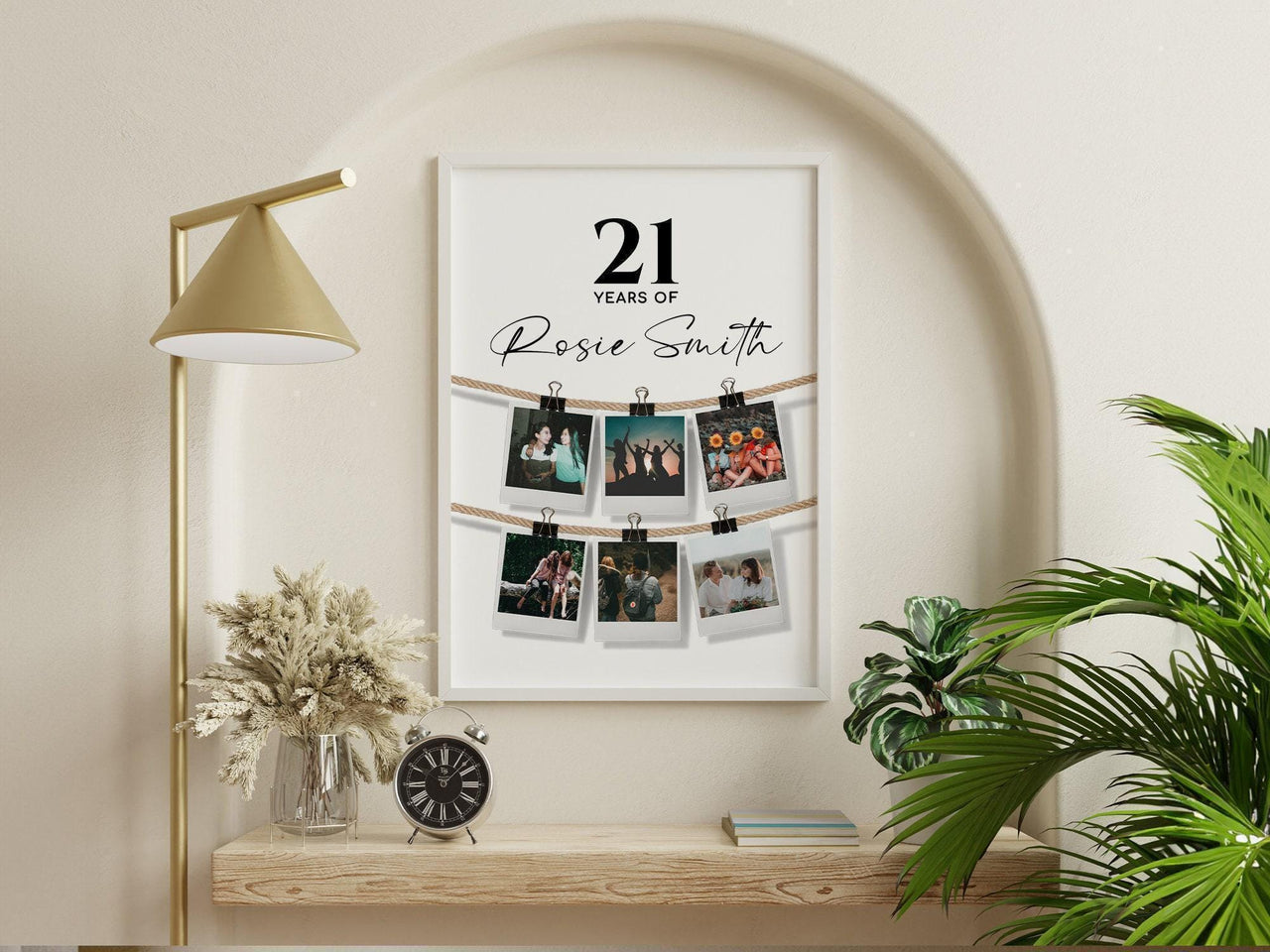 21st birthday photo collage poster with a name and instant style photos, framed above a shelf beside a brass lamp