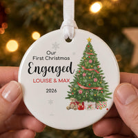 Engaged ceramic bauble: round, decorated Christmas tree with gifts, Our First Christmas Engaged, Louise & Max 2026
