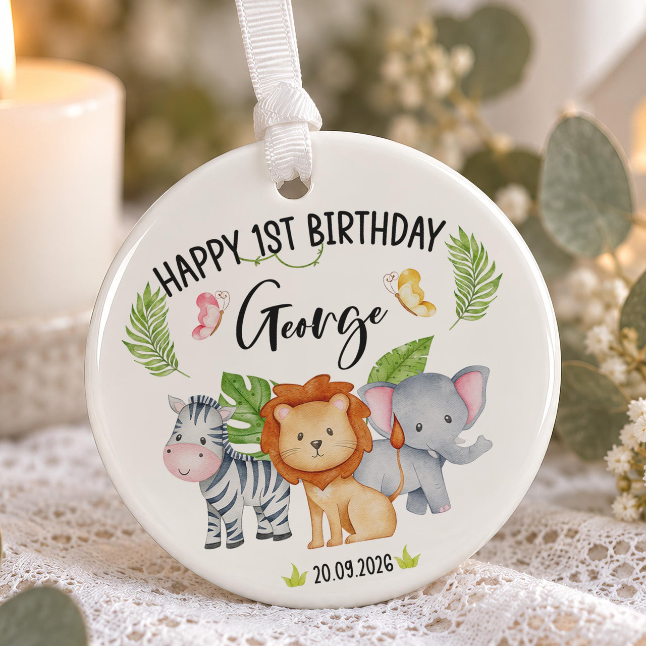 First birthday ornament: ceramic disc with a watercolour zebra, lion and elephant, Happy 1st Birthday George and a date