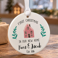 Pink house ceramic bauble with green sprigs, First Christmas in Our New Home, Nora & Jacob, Est. 2026