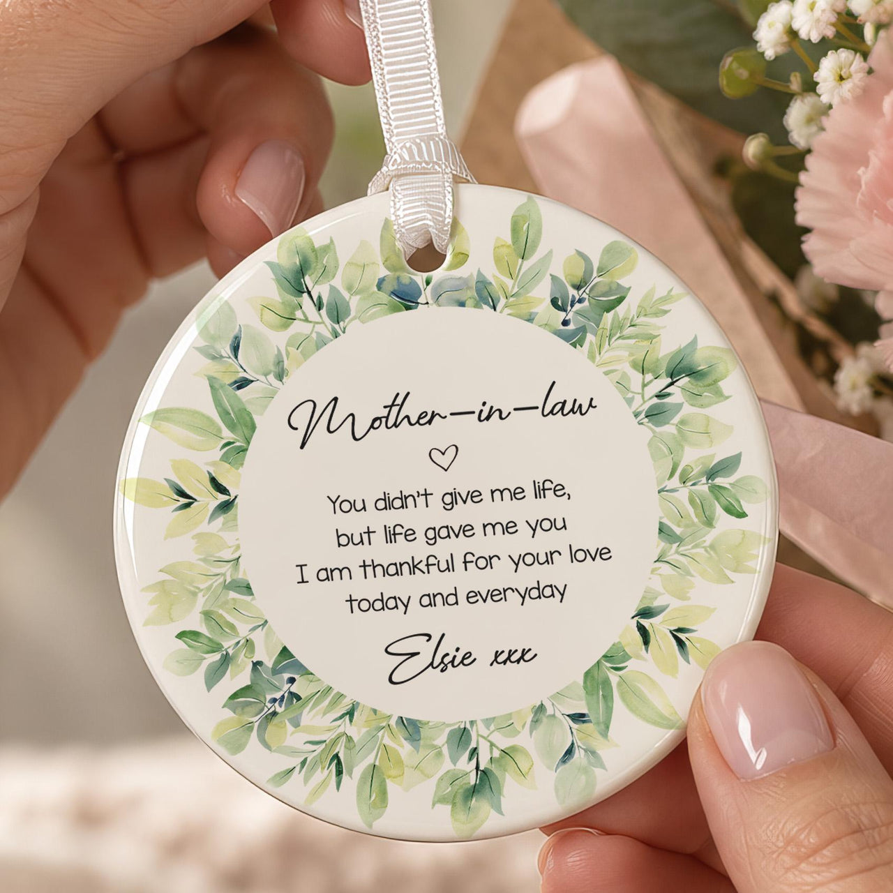 Mother in Law ceramic ornament: round bauble with a green watercolour leaf wreath, a short thank-you verse and Elsie xxx
