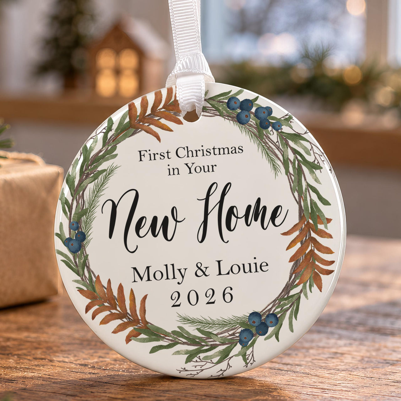 New home ceramic bauble: wreath of rust ferns and blue berries, First Christmas in Your New Home, Molly & Louie, 2026