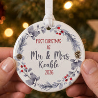 First Christmas married bauble: ceramic ornament with a blue-grey winter wreath, berries and Mr & Mrs Keable 2026