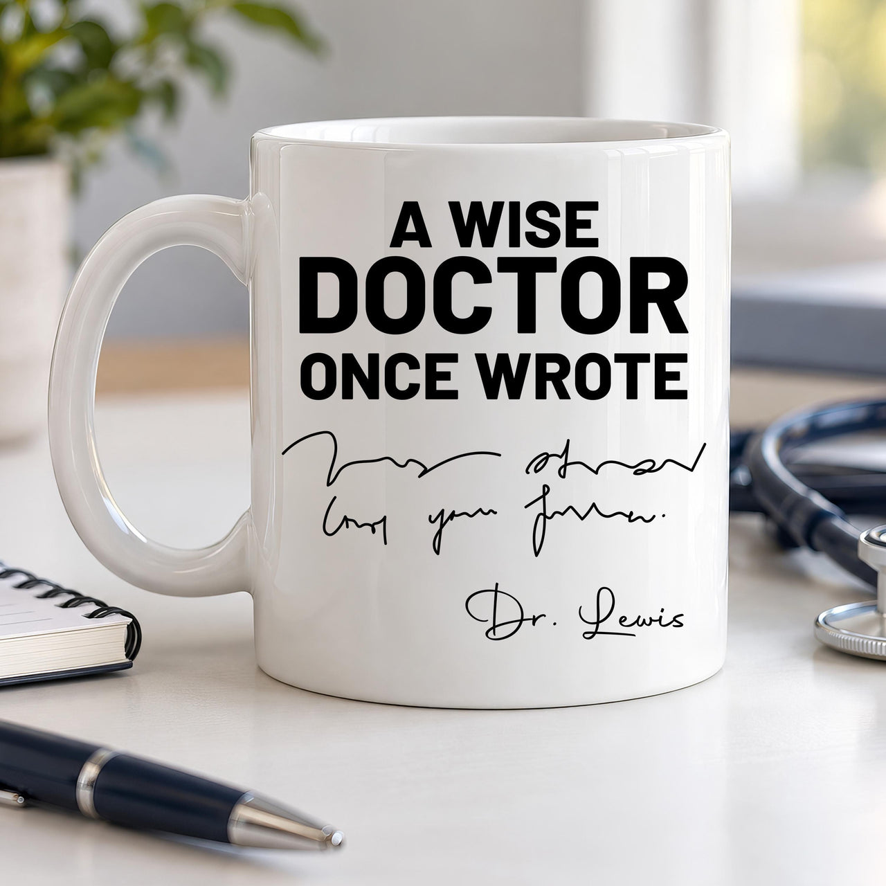 Personalised doctor mug: white mug reading A WISE DOCTOR ONCE WROTE above scribbled handwriting signed Dr. Lewis