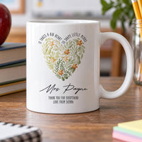 Personalised teacher mug: white mug with a leafy floral heart, Big Heart quote, Mrs Payne in script and Love from Sienna